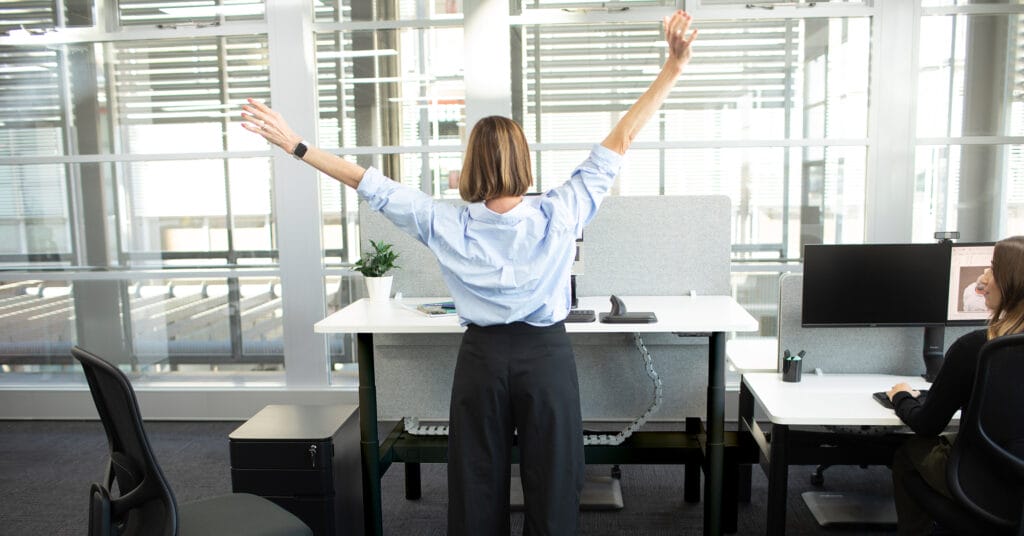 office-stretching woman stretching at work