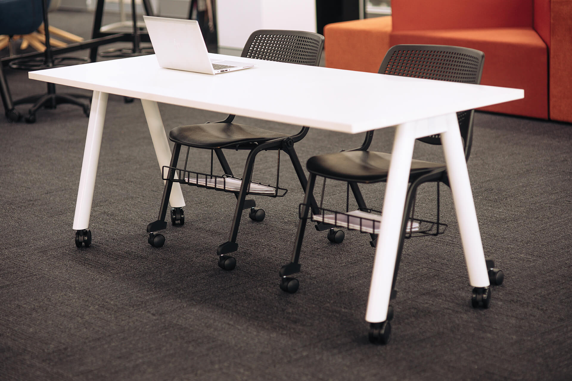 a frame training table with castors scene office