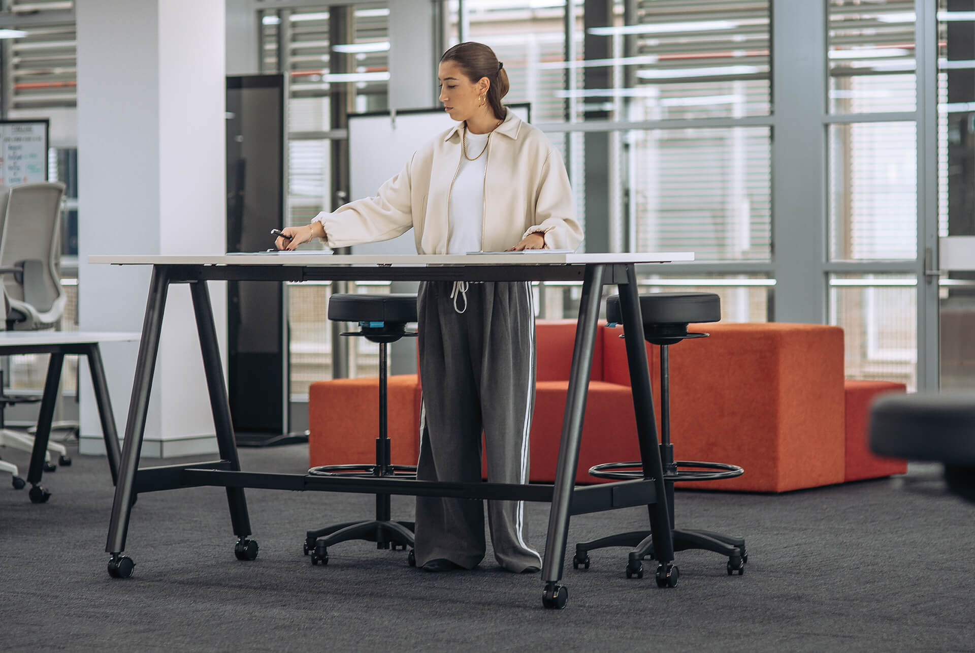 a frame high training table with castors scene office
