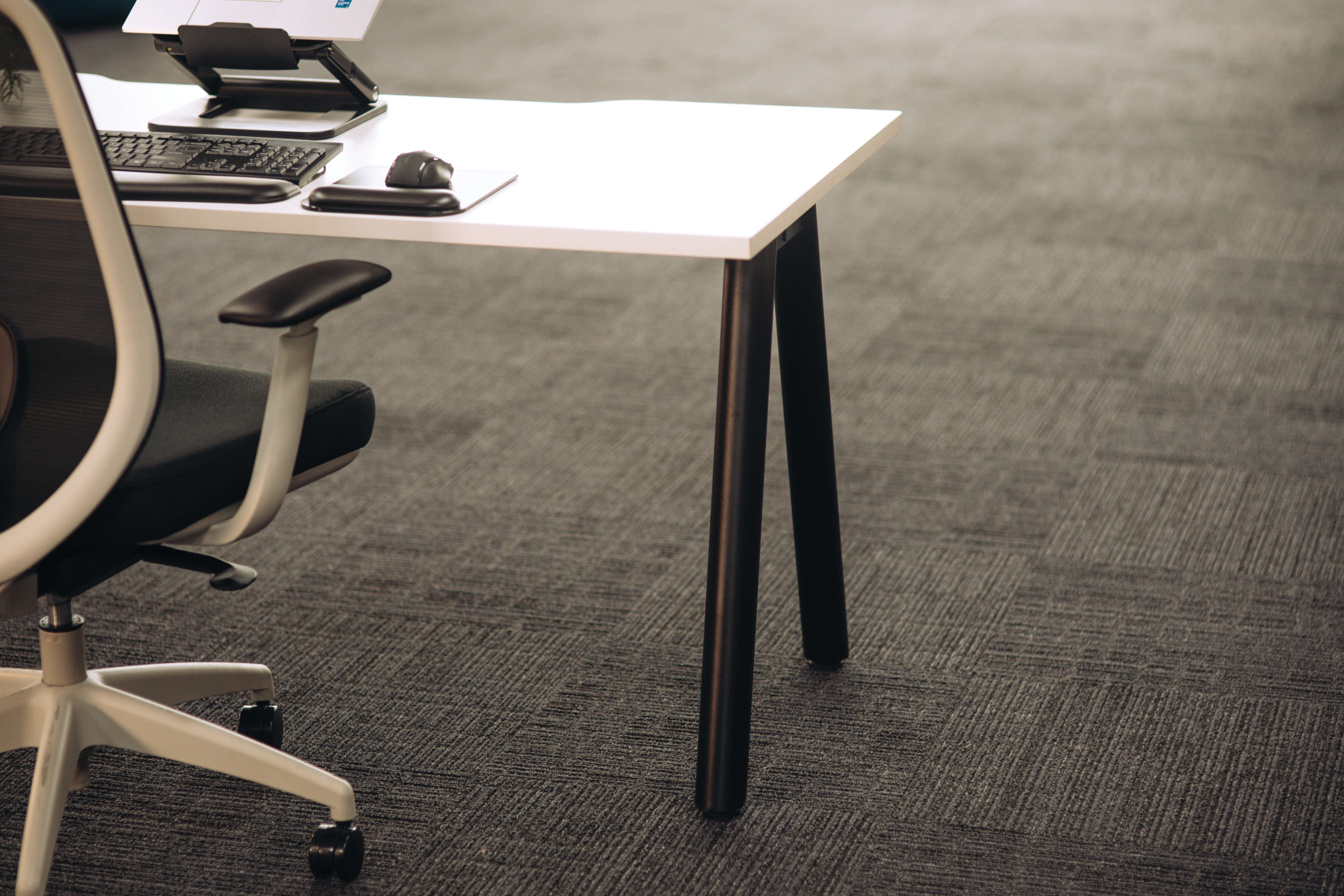 A Frame Round Leg Desk 1200x600 White/Black Frame Scene office