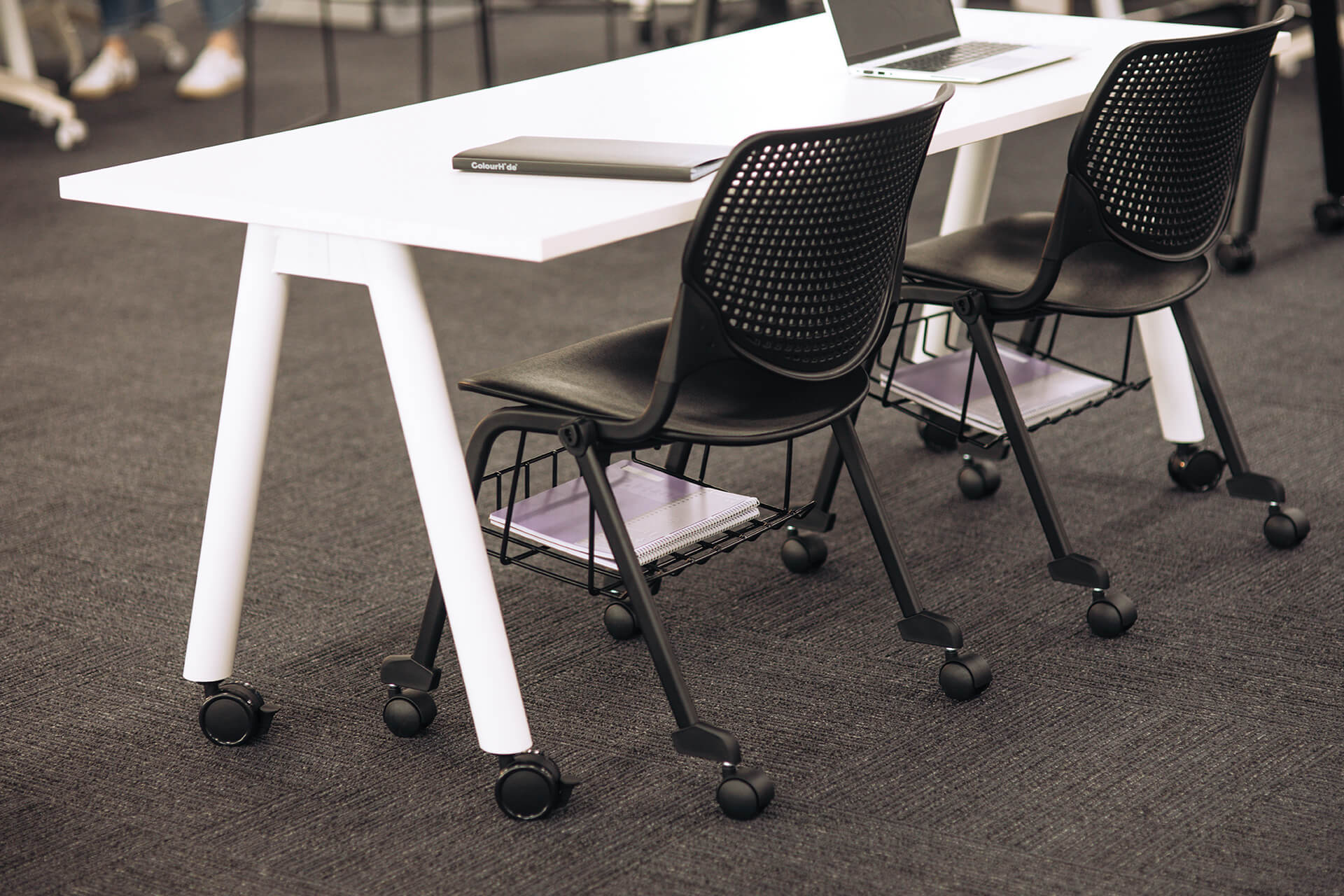 a frame training table with castors scene office