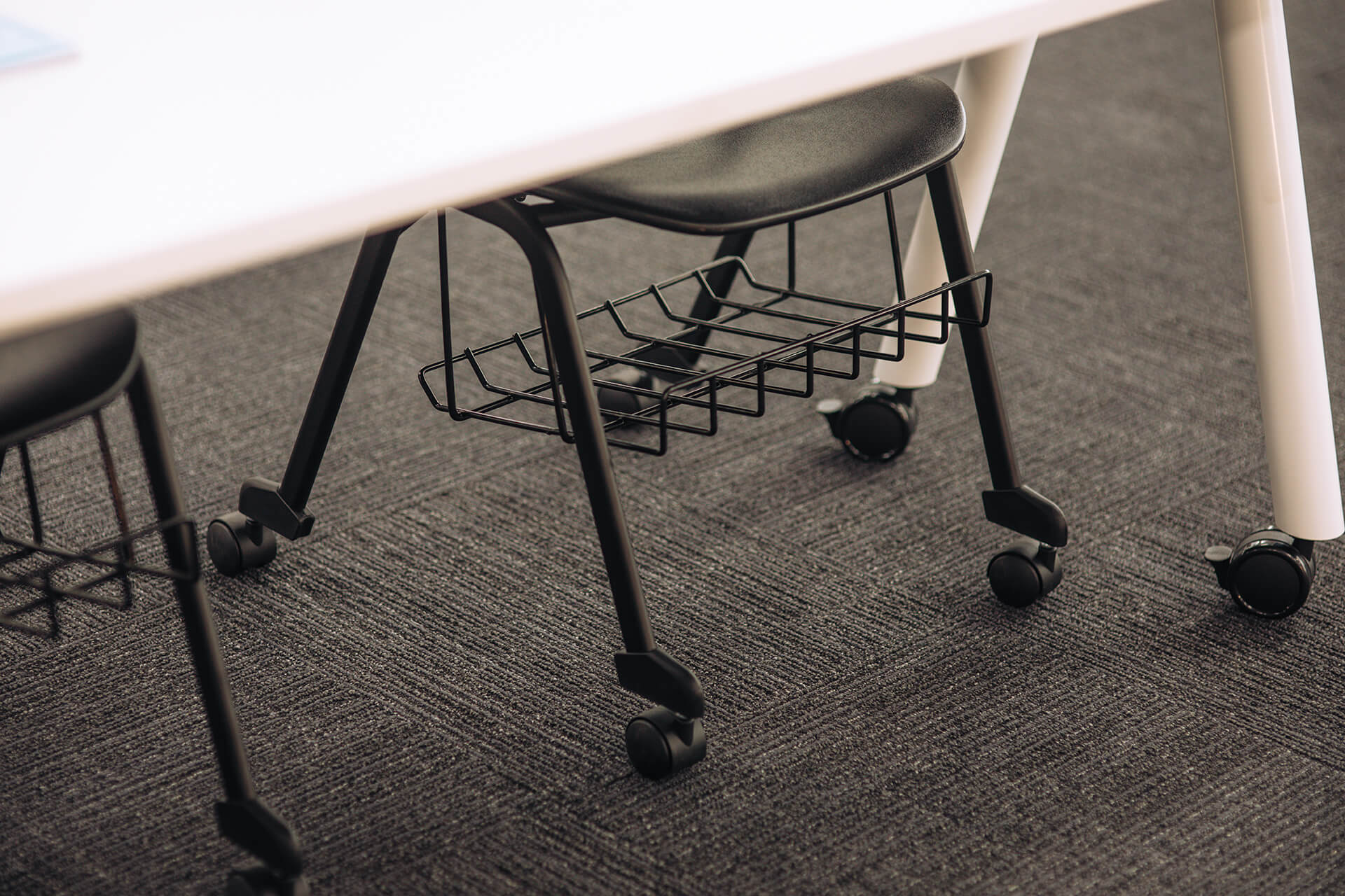 a frame training table with castors scene office